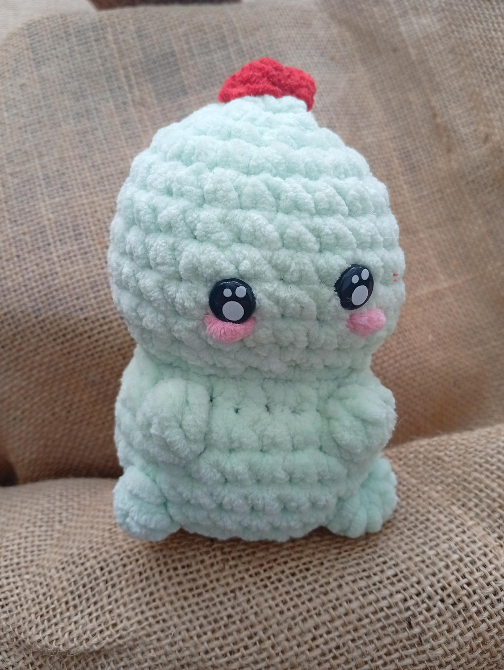 DINO ADORABLE VERDE CON ESCAMAS ROJAS