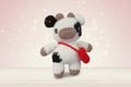 VACA MARRON ADORABLE CON BOLSO ROJO