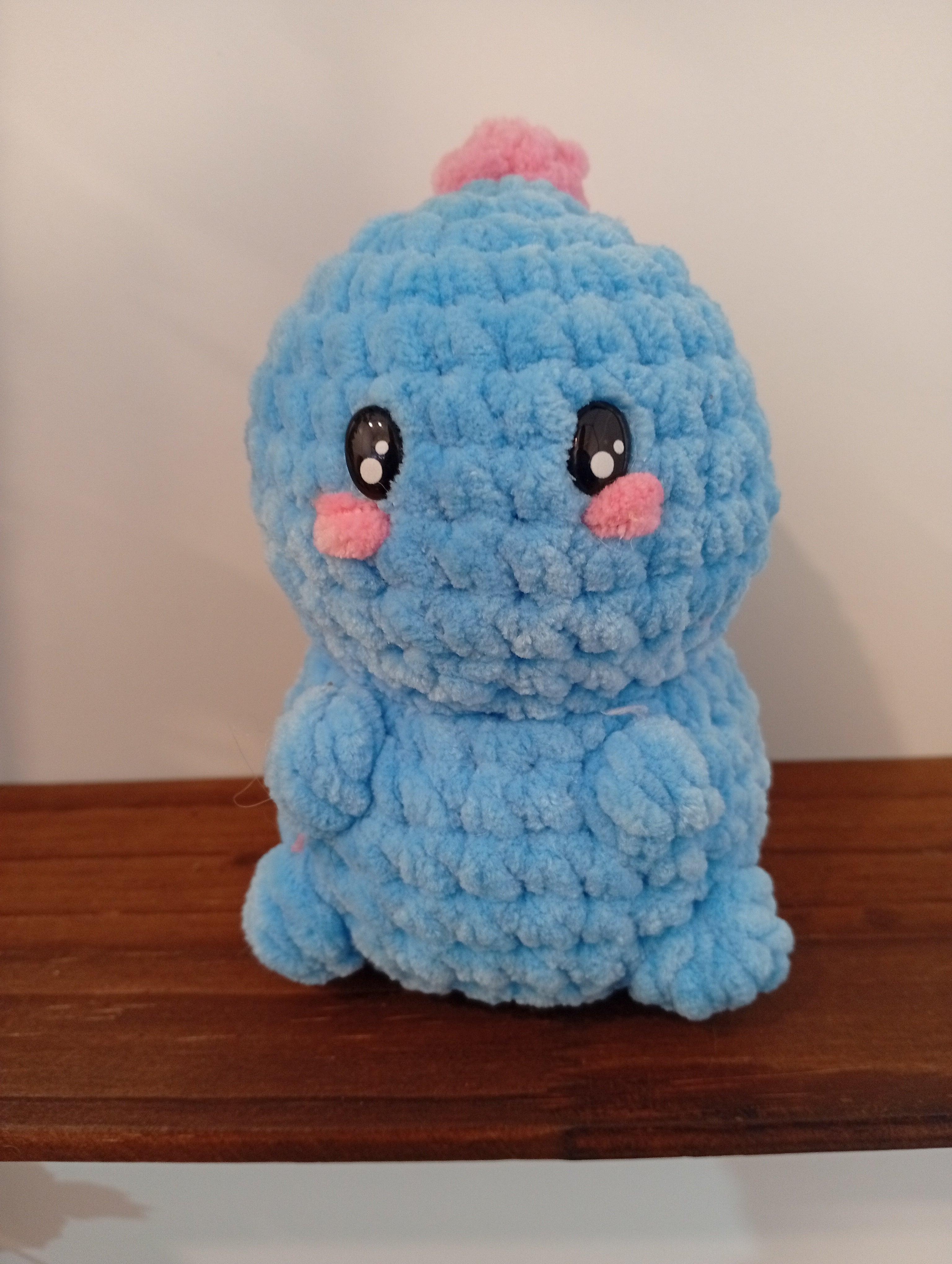 DINO ADORABLE COLOR AZUL Y ESCAMAS ROSAS